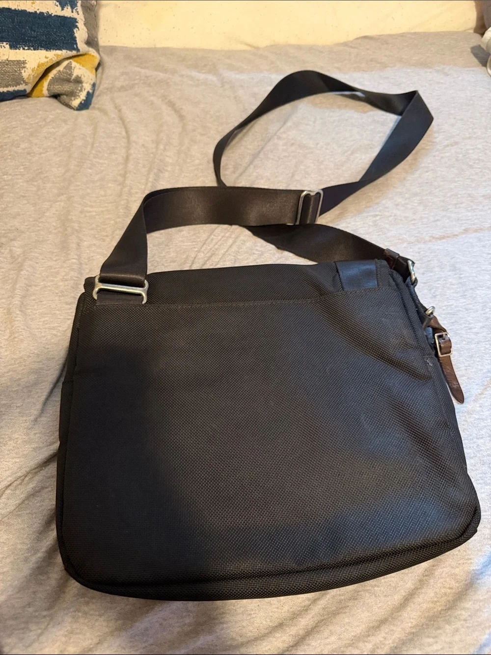 Tumi Black Messenger Bag with Brown Leather Trim